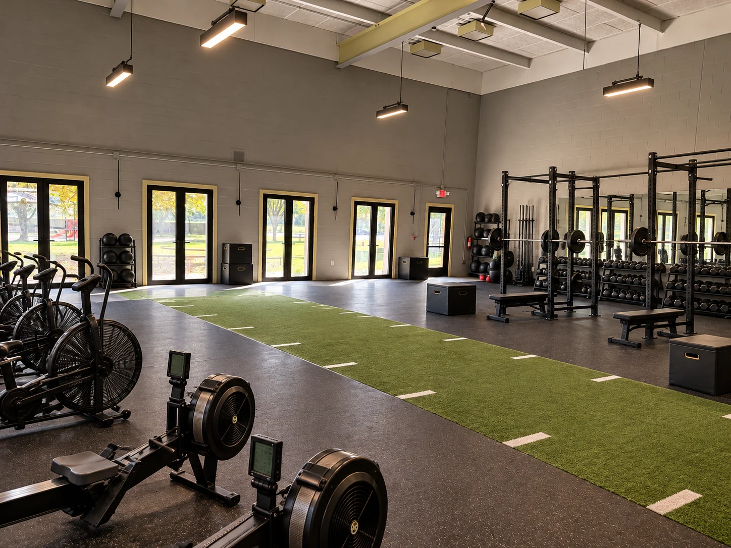 Concept rendering of the former gym at 50 Penn Avenue transformed into an athletic training studio with turf and strength equipment
